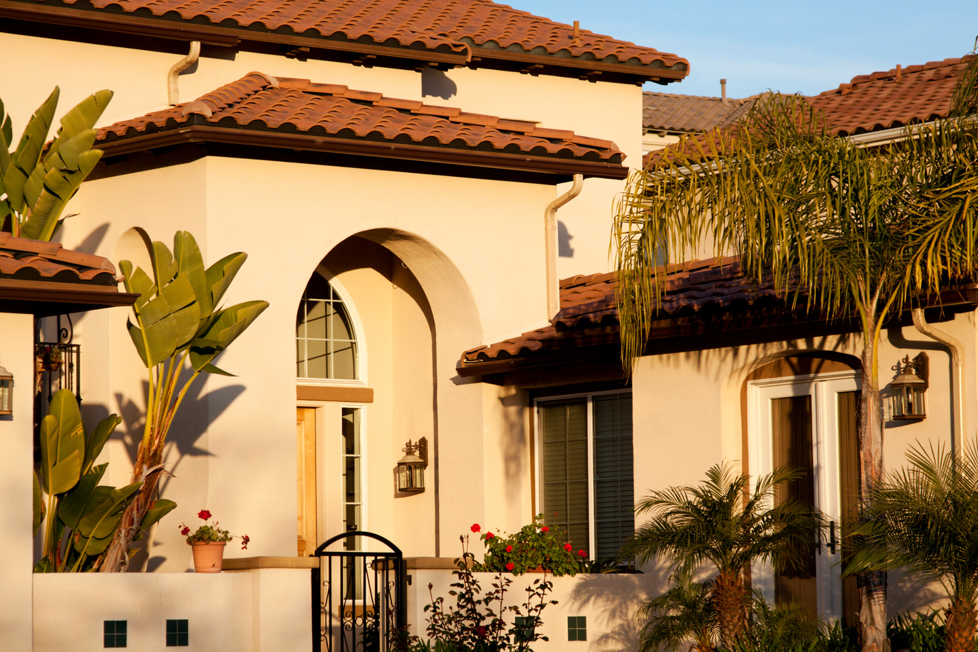 Stucco Home Exterior with Arched Entry